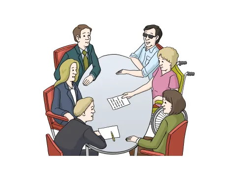 Menschen sitzen an einem Tisch und besprechen Themen