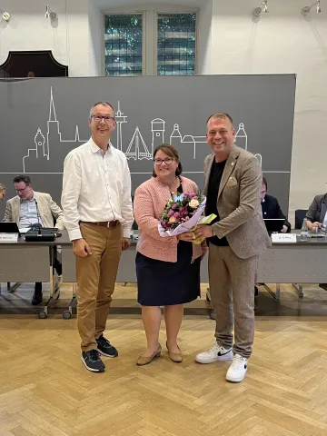 Blumen für neue Geschäftsführerin GSG