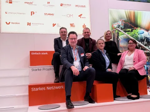 Gruppe auf Expostand
